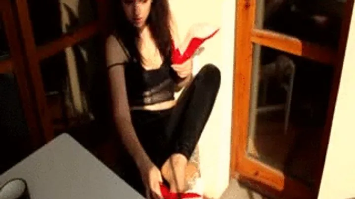 Red dangling shoes