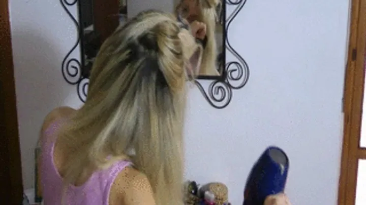 Elonora dry and brush her blond hair until are straight (2 PART