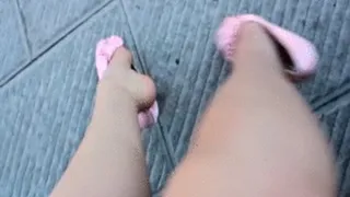 Dangling in a public bench