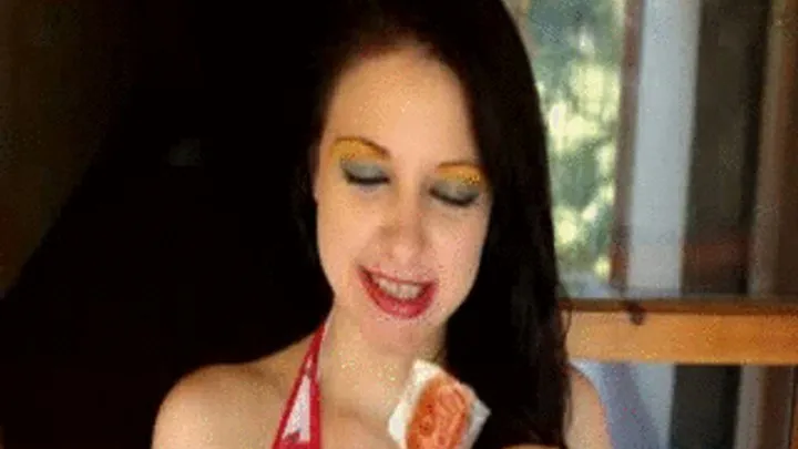 I lick and I chewin a orange lollipop