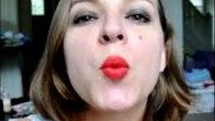 Kissy face Liz in red lipstick