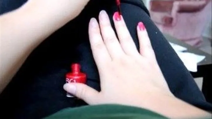 Long real fingernails painted red