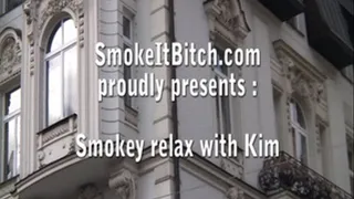 Kim smoking relax