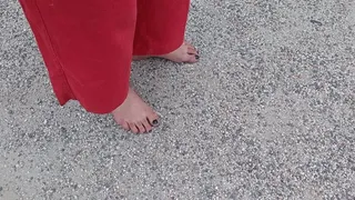 Barefoot on old asphalt