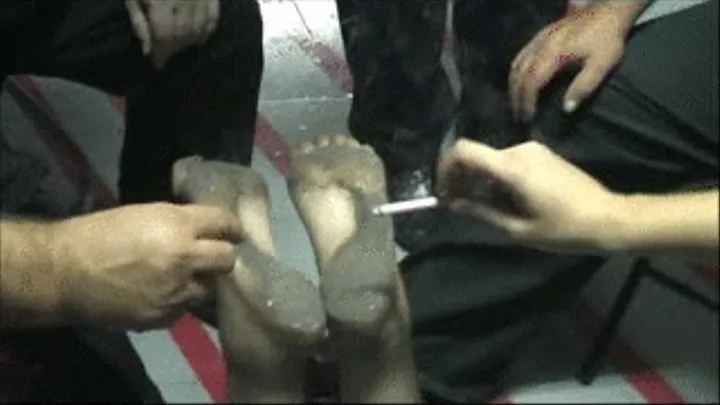 Slave girl´s foot with cigarrettes