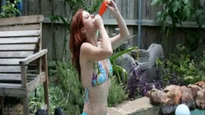 Redhead orange balloon blow to pop