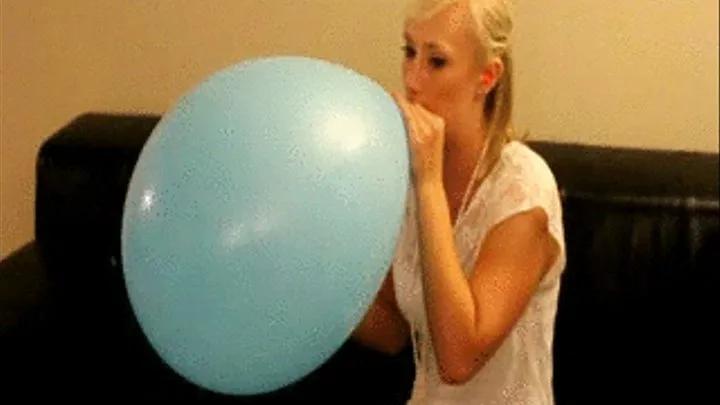 Kourtney blow up and sit pop blue balloon