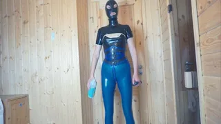 Latex pierced girl in blue transparent leggings, blouse and corset with automatic butt plug Part 1