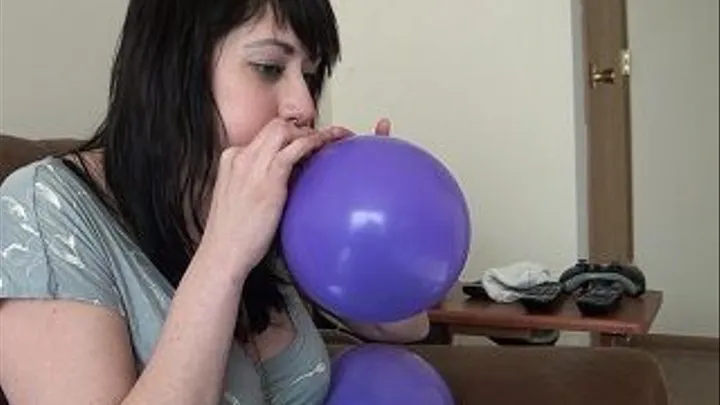 Delilah Popping Balloons