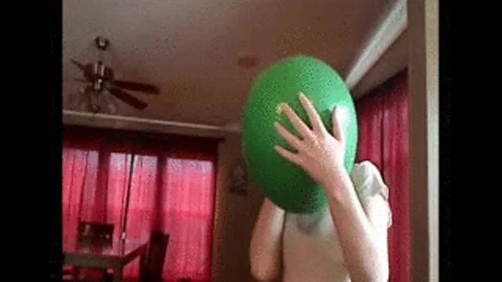 Blowing up 36" green balloon