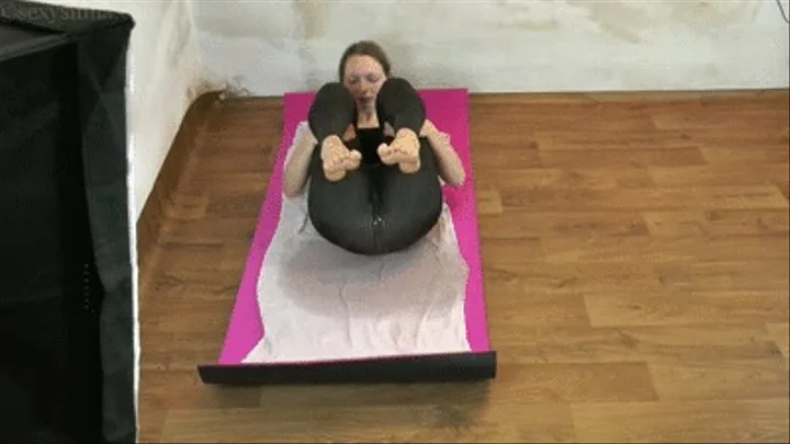 'Nonchalant peeing throughout full bladder exercise in spandex leggings on yoga mat'