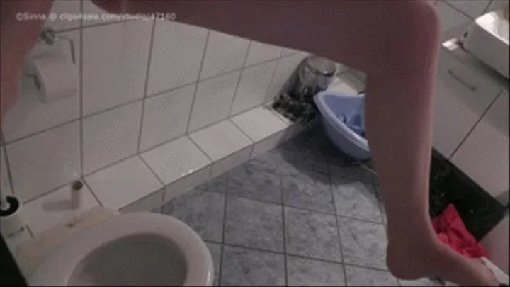 'Trying to pee like a guy from high above into the toilet'