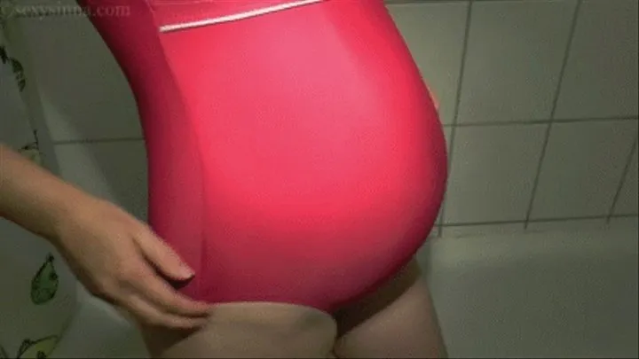 'Swimsuit fitting on huge belly and wetting'