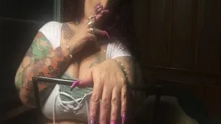 A smoking big Boob Tease