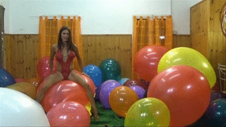 Dolores sits on big balloons