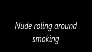 Nude roling around smoking