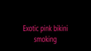 Exotic pink bikini smoking