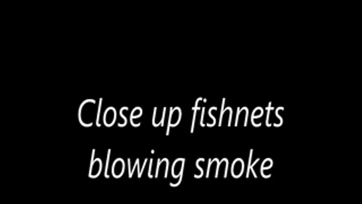 Close up fishnets blowing smoke
