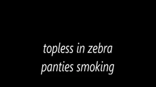 topless in zebra panties smoking