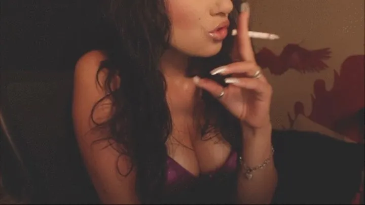 Divine Belle in purple lingerie smoking