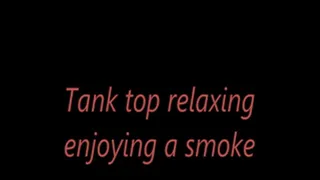 Tank top relaxing enjoying a smoke