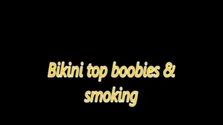 Bikini top boobies and smoking