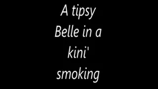 A silly Belle in a kini' smoking