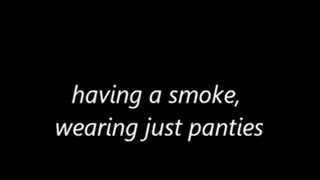 having a smoke, wearing just panties