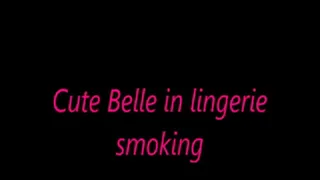 Cute Belle in lingerie smoking