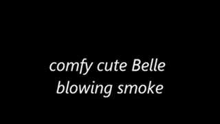 Comfy cute Belle blowing smoke