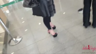 Public flashing with the highest heels as possible at the airport!