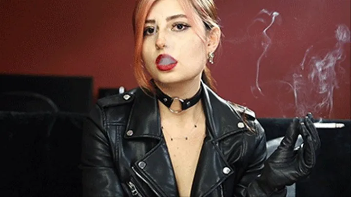 Amelia smoking in leather