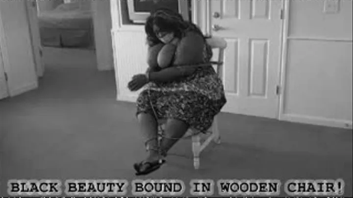 Big Titted Black Gal Bound and struggling in a Chair