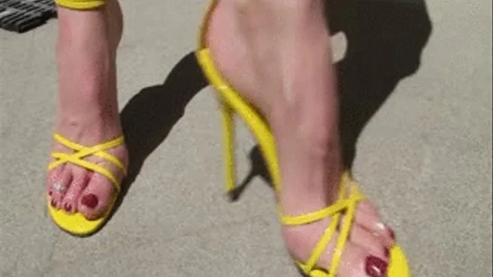 Penny Dangles Her Yellow Strappies