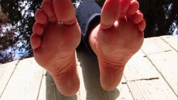 Penny Red Toes Pointing and Soles Dangling