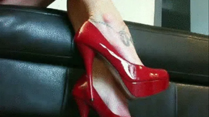 Dangling my sexy red heels