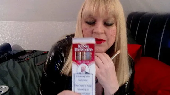 Mistress smoking her King Edward Cigar