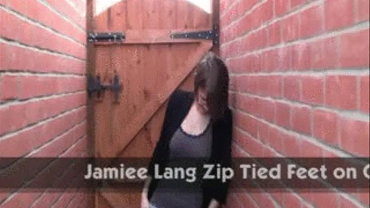 Jamiee Lang Zip Tied Feet on Gravel