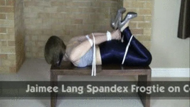 Jamiee Lang Spandex Frogtie on Coffee Table