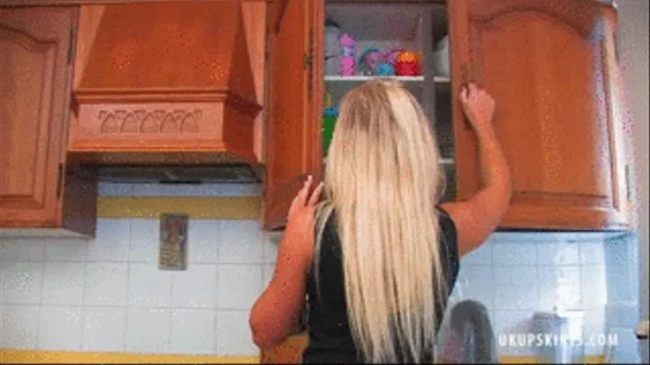 UKU Summer R is working away in her kitchen unaware we are peeping up her skirt at her panties - Mpeg