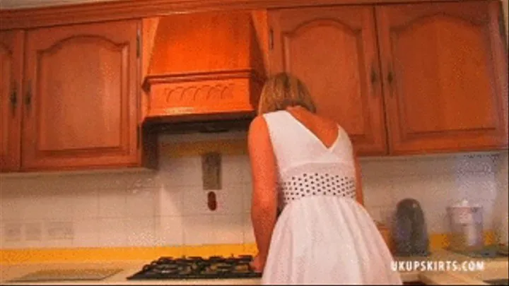 UKU Demi Scott is in her kitchen cleaning. But she catches us peeping up her skirt at her lovely sexy panties - iPod