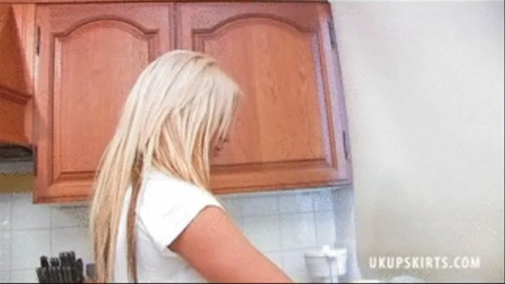 UkU Laura M is in her kitchen claening up. But does she know that someone peeping up her skirt at her panties - iPod