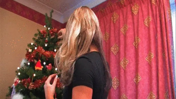 UKU Jodine H decorating her xmas tree but catches us peeping at her panties