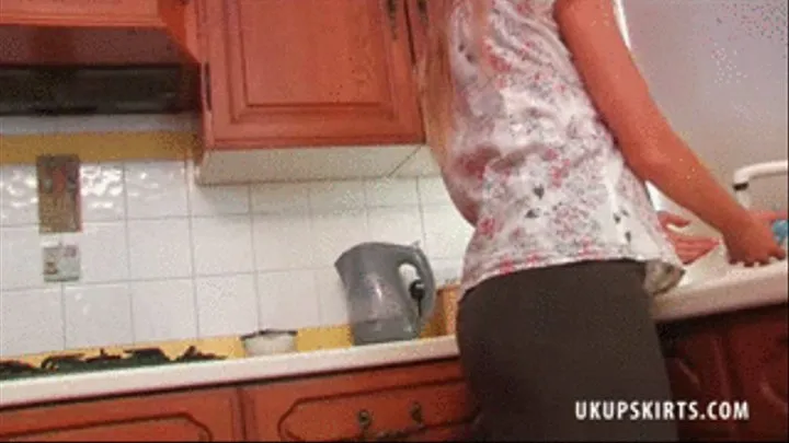 UKU Watch Hayley-Marie Coppin as she wipes down her kitchen skirt bending over or squatting, always in a position that encourages us to look up her skirt - Mpeg