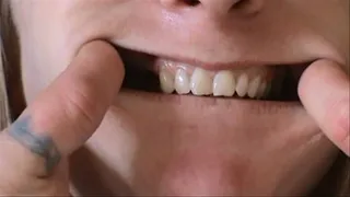Miz Checks Her Teeth