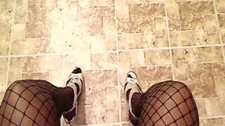 sliver high heels and fishnets lap view