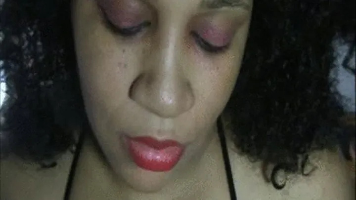 Applying Red Lipgloss on my ebony lips