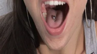 Rachel Rose: Pierced Tongue In An Open Mouth