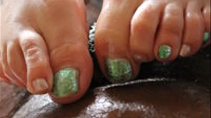 St.Patty's Day footjob close up.