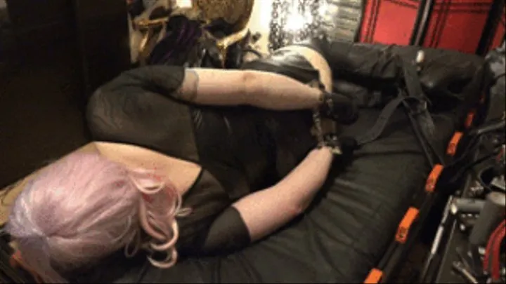 Helpless tied on the bondagebed and to orgasm